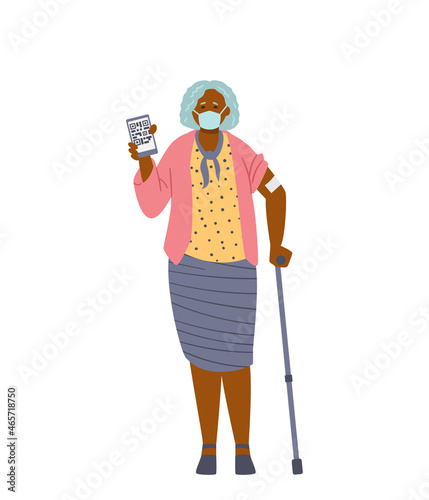Senior african american woman vaccinated showing arm with patch and phone with health passport. Isolated on white.