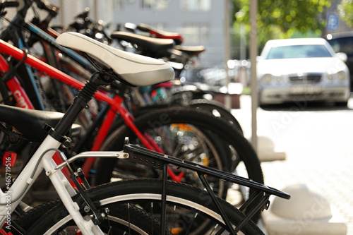 Bicycle parking with different bicycles, selective focus