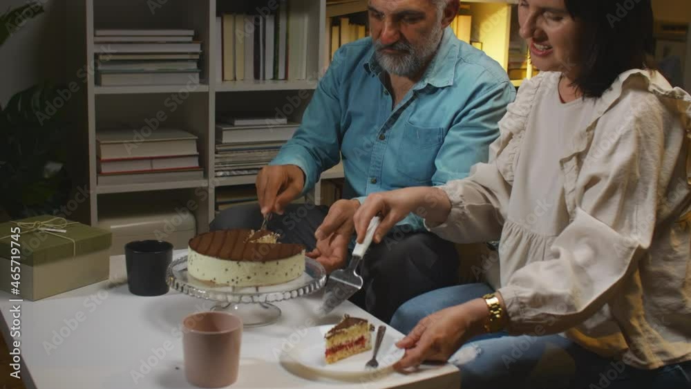 mature couple celebrating anniversary at home mature couple celebrating anniversary at home