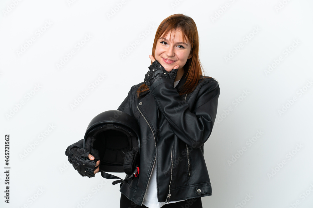 Redhead girl with a motorcycle helmet isolated on white background happy and smiling Redhead girl with a motorcycle helmet isolated on white background happy and smiling