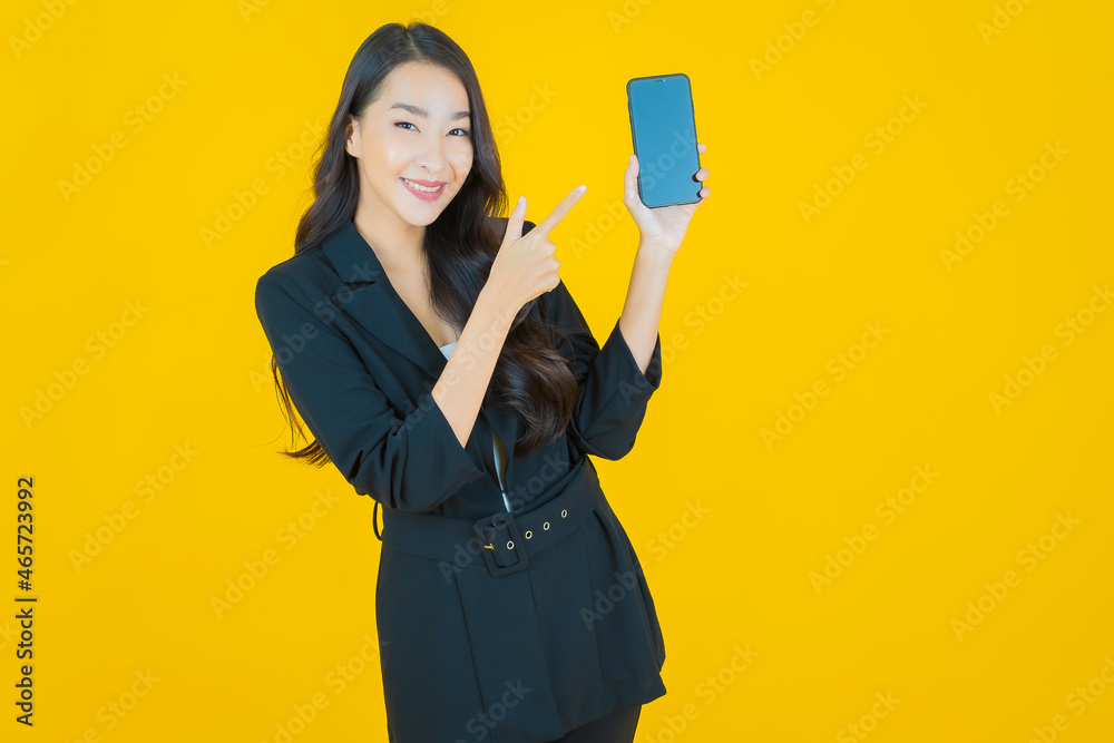 Portrait beautiful young asian woman smile with smart mobile phone Portrait beautiful young asian woman smile with smart mobile phone