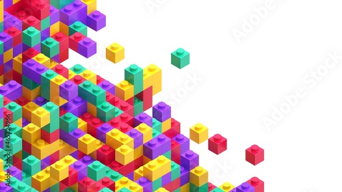 Colorful toy bricks abstract background. Many irregular chaotic small toy blo...