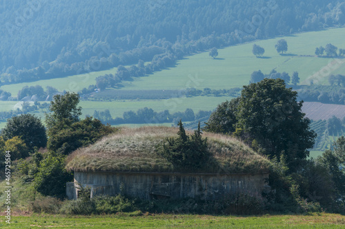 massive air raid shelter on green field