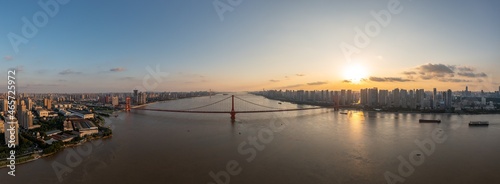 Wuhan skyline and Yangtze river with supertall skyscraper under construction in Wuhan Hubei China.	
