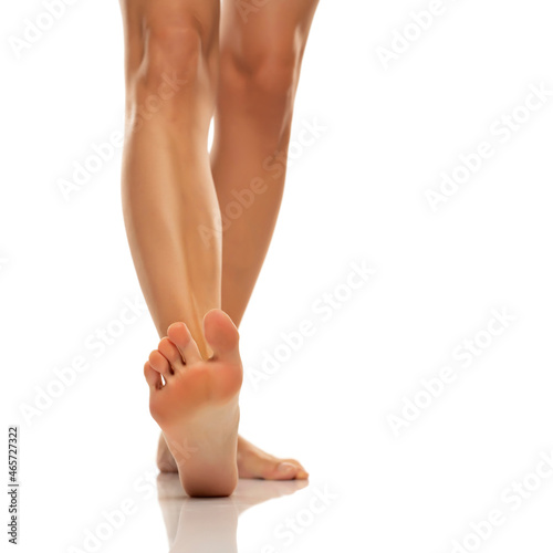 Fototapeta Nude barefoot female leg and sole