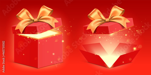 Vector set of open red gift boxes with a golden ribbon and magical glitter light, shining from inside. Mysterious present box standing on red gradient background. photo