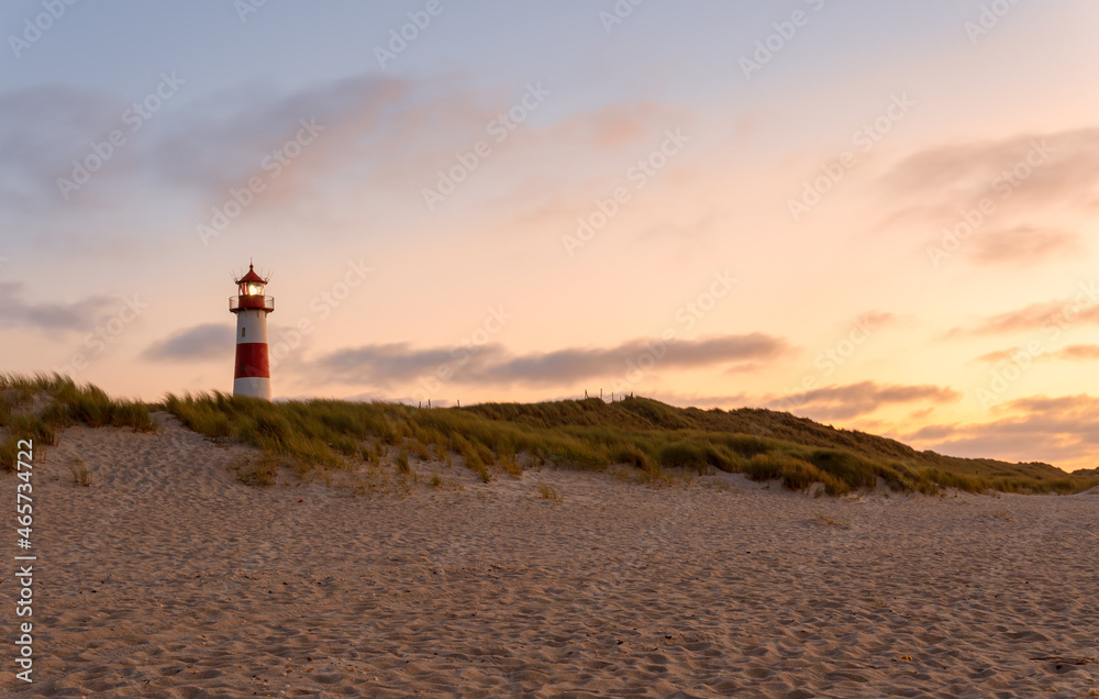 Beautiful Lighthouse List-Ost in sunset light - on the island Sylt, Germany 