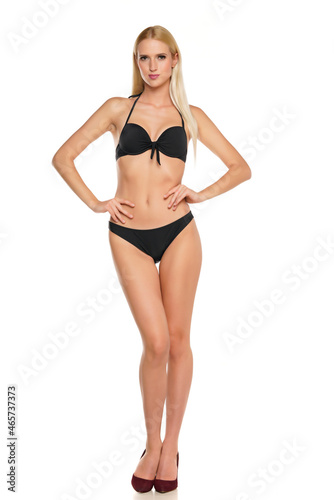 Young blond woman posing in swimsuit