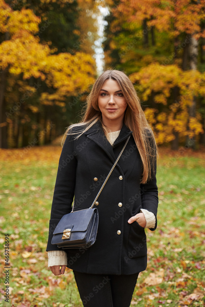 beautiful girl with long hair in autumn forest with yellow trees beautiful girl with long hair in autumn forest with yellow trees