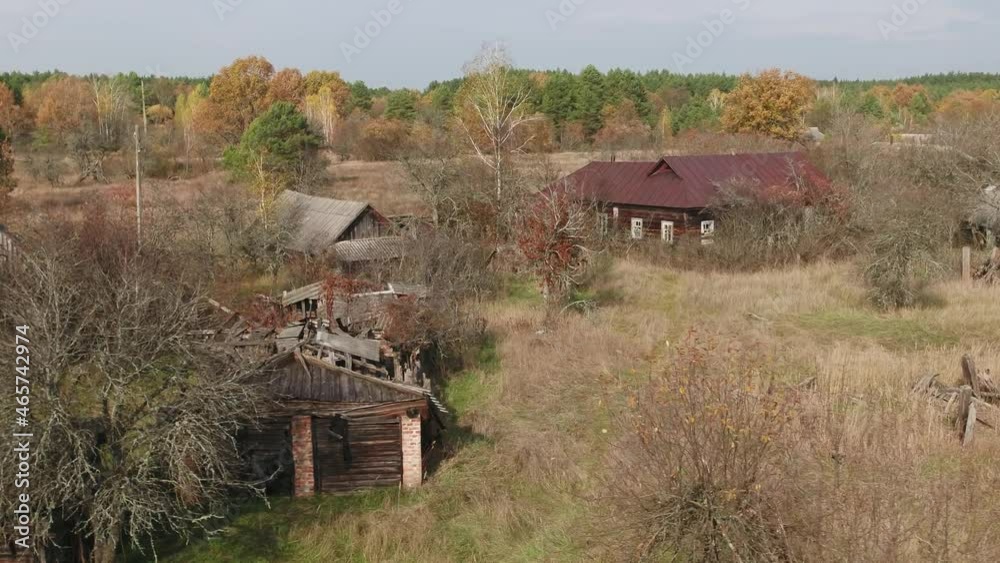 The abandoned village of Rudnya-Veresnya after the accident at the Chernobyl nuclear power plant. The destroyed houses of the villagers. Aerial. Autumn The abandoned village of Rudnya-Veresnya after the accident at the Chernobyl nuclear power plant. The destroyed houses of the villagers. Aerial. Autumn