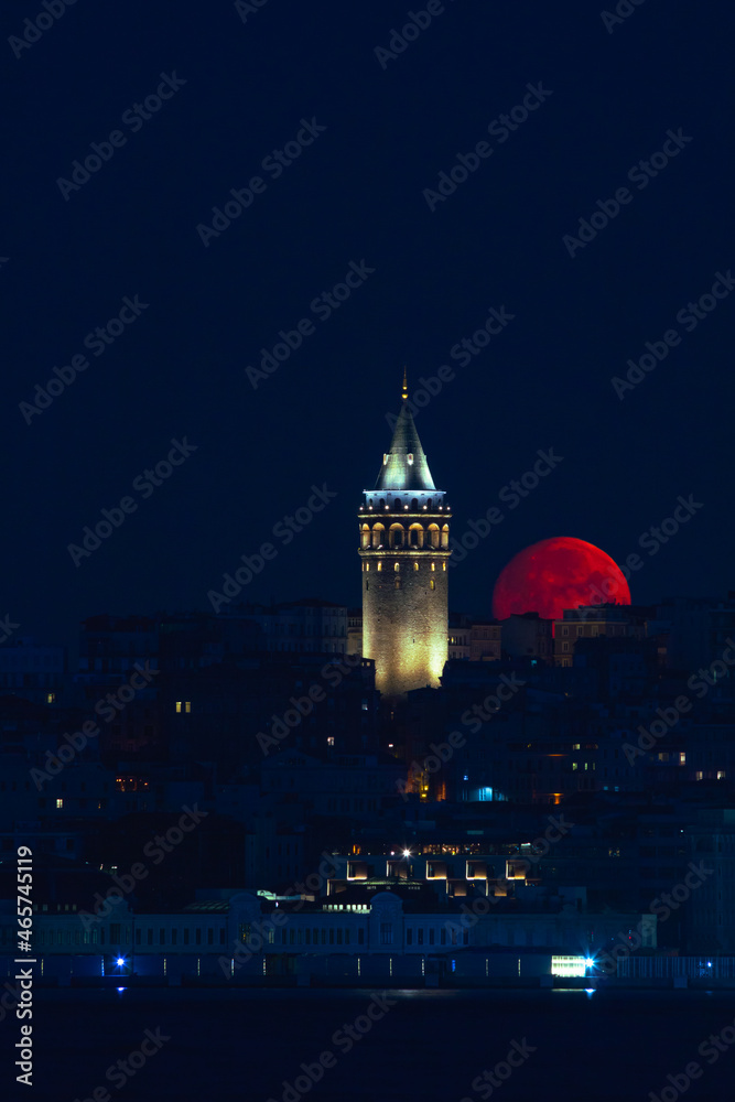 Galata Tower at moonset in Istanbul. Istanbul story background photo. Travel to Turkey. Ramadan, kandil, iftar, laylat al-qadr, islamic new year, eid mubarak background photo.