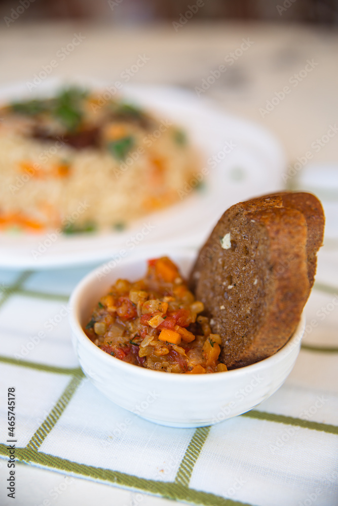 black bread with vegetable stew on the table black bread with vegetable stew on the table
