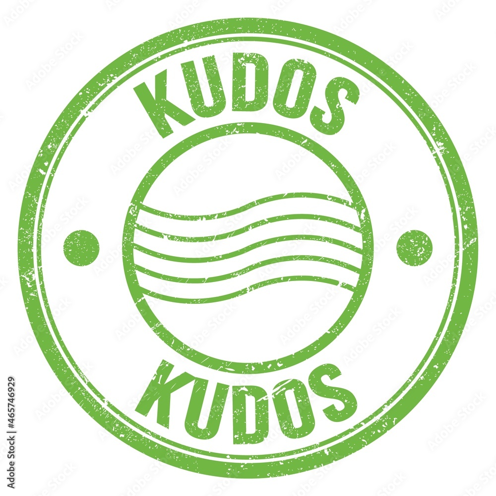 KUDOS text written on green round postal stamp sign KUDOS text written on green round postal stamp sign