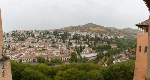 View at the main Granada city, view from the Alhambra citadel palace lookout, architecture buildings and horizon, Spain