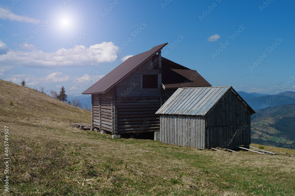 Wooden house and shed in the mountains