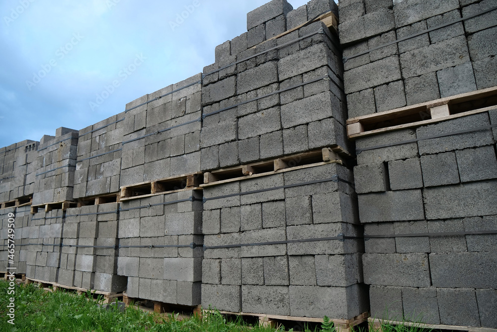 Grey slag stones in stacks at construction supermarket Grey slag stones in stacks at construction supermarket