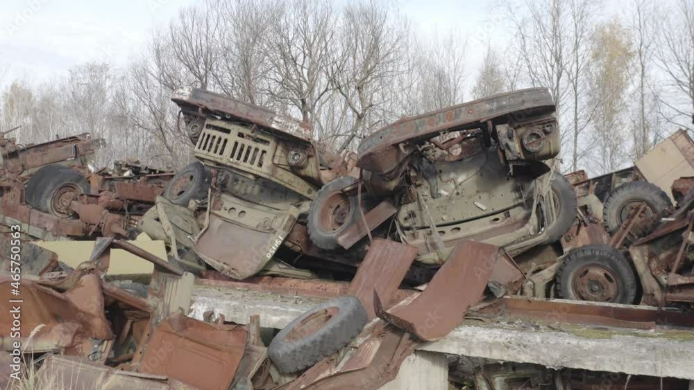 Aerial video. Old abandoned equipment that took part in the elimination of the accident. The village of Rassokha. Chernobyl. Rusty machinery. Aerial video. Old abandoned equipment that took part in the elimination of the accident. The village of Rassokha. Chernobyl. Rusty machinery.