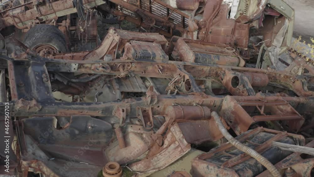 Aerial video. Old abandoned equipment that took part in the elimination of the accident. The village of Rassokha. Chernobyl. Rusty machinery. Aerial video. Old abandoned equipment that took part in the elimination of the accident. The village of Rassokha. Chernobyl. Rusty machinery.
