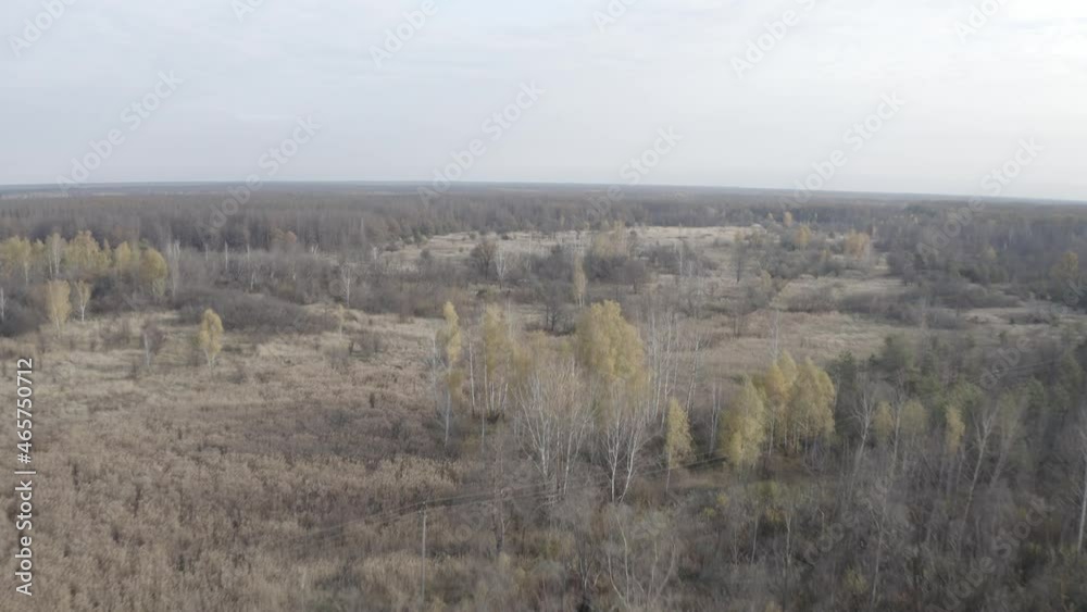 Aerial video. Old abandoned equipment that took part in the elimination of the accident. The village of Rassokha. Chernobyl. Rusty machinery. Aerial video. Old abandoned equipment that took part in the elimination of the accident. The village of Rassokha. Chernobyl. Rusty machinery.
