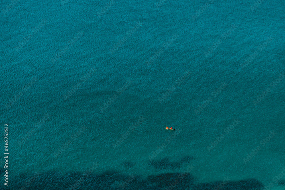 Top view of the amazing azure sea water with yachts, minimalist natural landscape