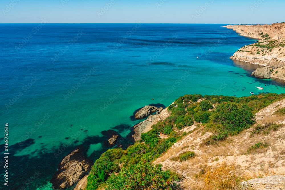 Panoramic sea view on Cape Fiolent in Crimea. A famous place for tourists on the Black Sea coast with azure water Panoramic sea view on Cape Fiolent in Crimea. A famous place for tourists on the Black Sea coast with azure water