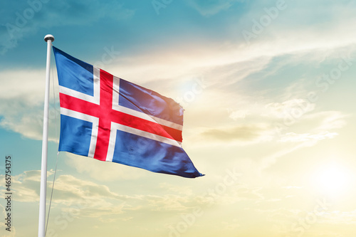 Iceland national flag cloth fabric waving on the sky - Image