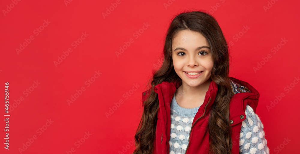 female fashion model. teen girl in down vest. face portrait of child wearing warm clothes. female fashion model. teen girl in down vest. face portrait of child wearing warm clothes.