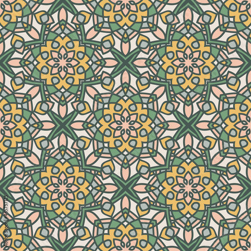 Abstract seamless mandala background. Texture in yellow and pale green colors. Oriental pattern for design, fashion print, scrapbooking