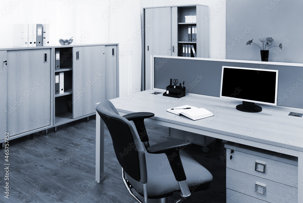 monitor on a desk in modern office