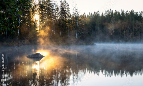 Autumn swedish lake and morning sunlight