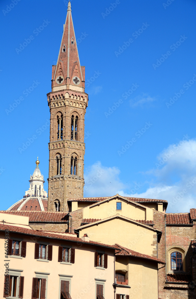 The beautiful San Firenze square in Florence with the palaces of the Renaissance, the bell tower of the Florentine Badia. 