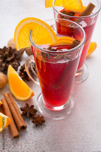 Mugs of mulled wine. Ingredients for a cocktail. Hot winter drinks based on sparkling wine.