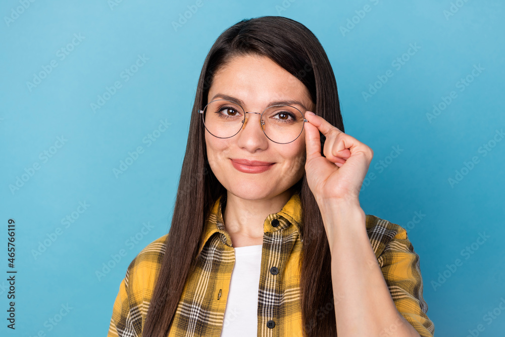 Photo of mature attractive woman happy positive smile wear eyeglasses oculist isolated over blue color background