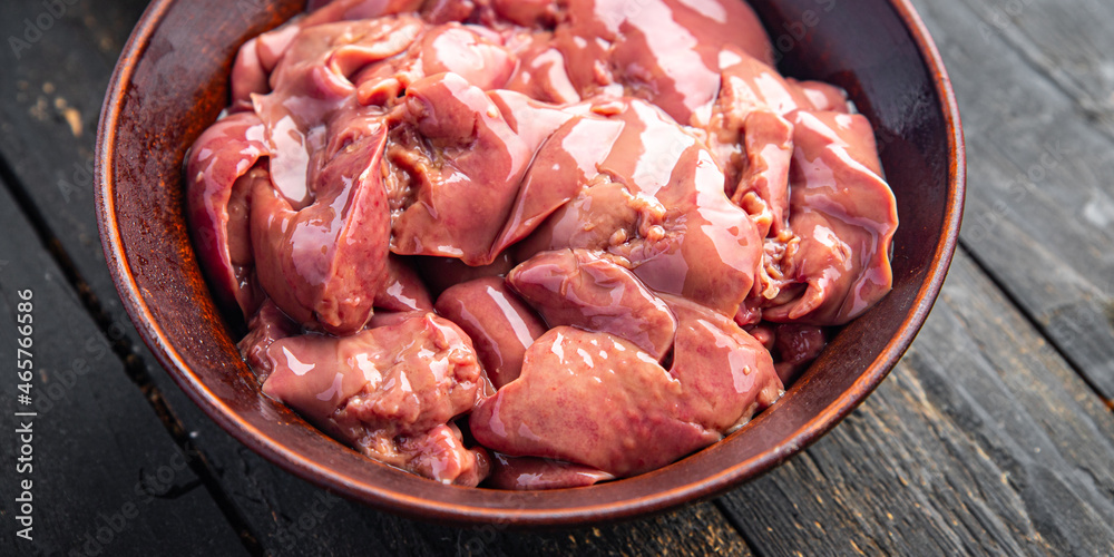 chicken liver raw piece portion ready to eat meal snack on the table copy space food background rustic. top view keto or paleo diet chicken liver raw piece portion ready to eat meal snack on the table copy space food background rustic. top view keto or paleo diet