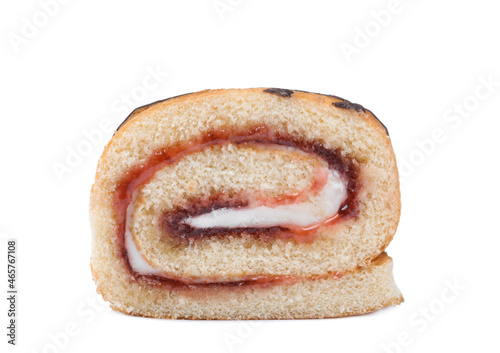 Tasty cake roll with cream and jam isolated on white