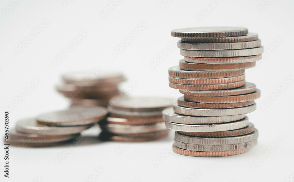money coins to stack of coins.Saving money for future use concept and money financial business growth concept. isolated on white background money coins to stack of coins.Saving money for future use concept and money financial business growth concept. isolated on white background