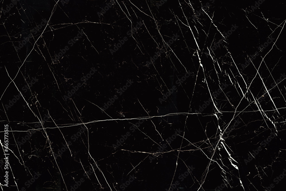 Black marble, patterned background texture.