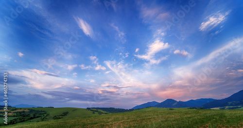 Beautiful landscape at sunset. Cloud background. photo