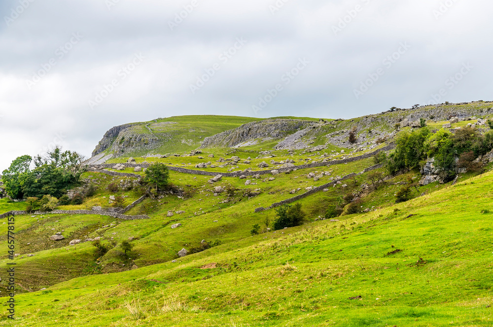 A view of an escarpment on the slopes on Ingleborough, Yorkshire, UK in summertime