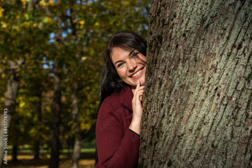 Beautiful young girl in the autumn forest on a sunny day Beautiful young girl in the autumn forest on a sunny day