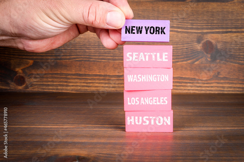 USA cities (New York, Seattle, Washington, Los Angeles, Huston). Colored wooden blocks #465778910