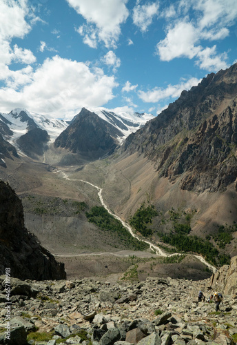 Mountain river flows down from the glacier