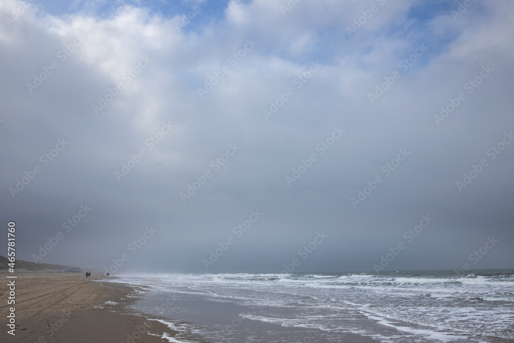 Clouds and blue sky. Waves. Julianadorp coast Netherlands. Northsea.