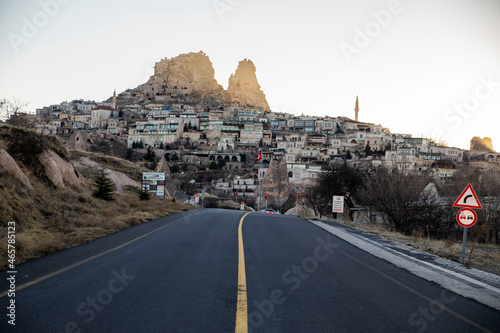 road leading to sunset and rock castle in Cappadocia turkey © Zach