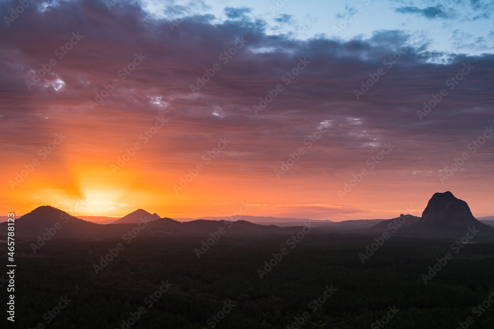 Fototapeta premium Glass House Mountains, Sunshine coast, Queensland, Australia, Mount Beerwah, Mount Tibrogargan, Mount Coonowrin, Gubbi Gubbi, Jinibara, Kabi Kabi Sacred place Bora Ring