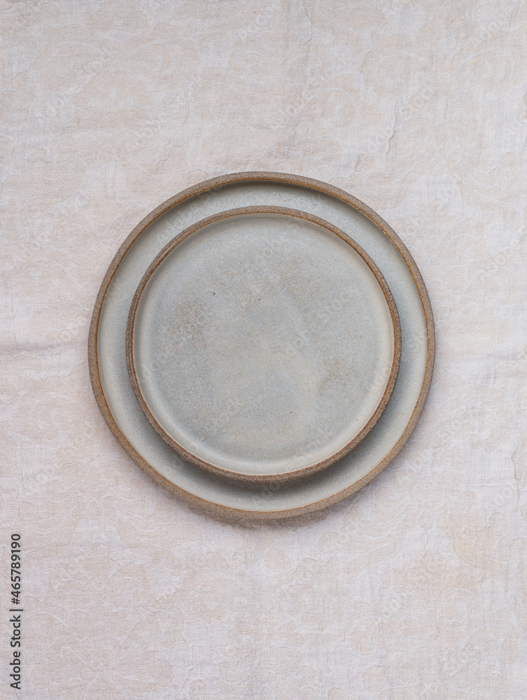 empty grey plates and linen napkin. Cooking background. Rustic style. Selective focus. Top view, copy space empty grey plates and linen napkin. Cooking background. Rustic style. Selective focus. Top view, copy space