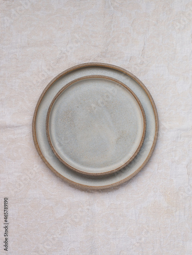 empty grey plates and linen napkin. Cooking background. Rustic style. Selective focus. Top view, copy space