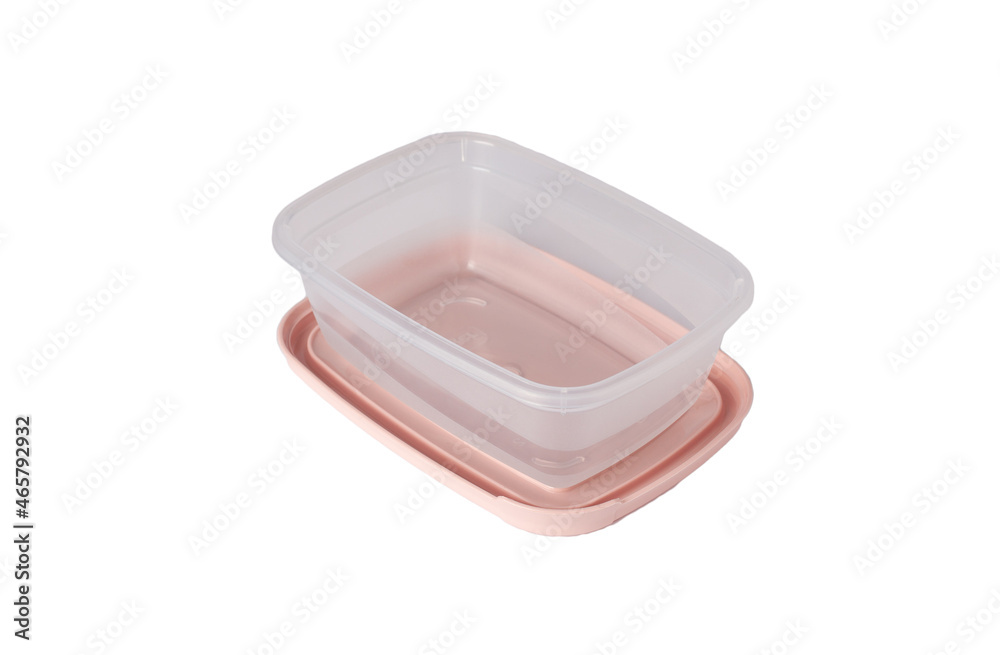 Open plastic food storage container with pink lid isolated on white background. Food box for lunch.