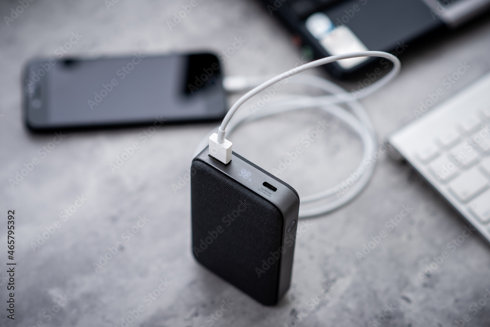 Fototapeta premium Charging the smartphone