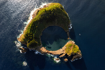Green island with lagoon in sea